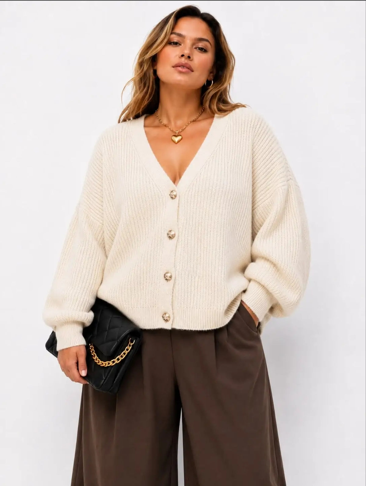 Gilet oversize taupe ou beige à boutons dorés