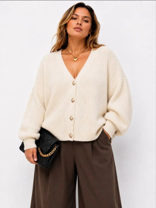 Gilet oversize taupe ou beige à boutons dorés