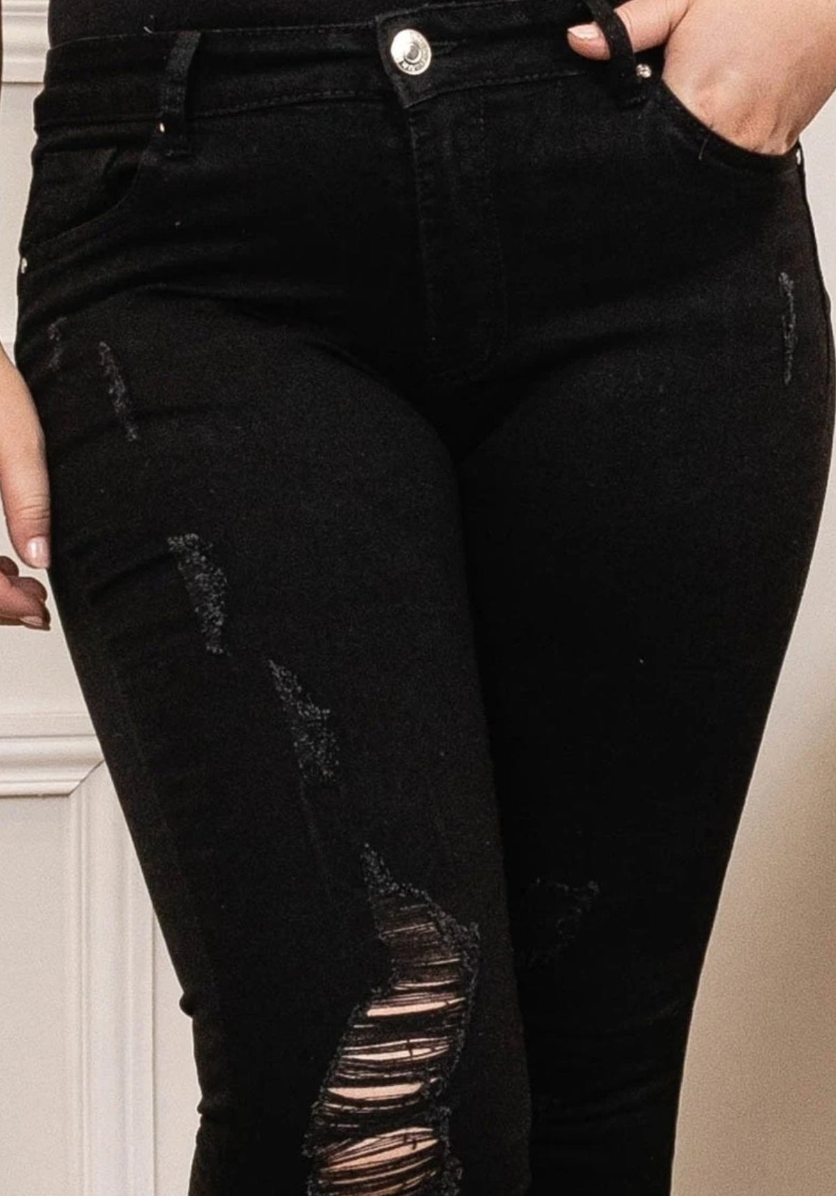 Jean noir skinny déchiré effet push-up